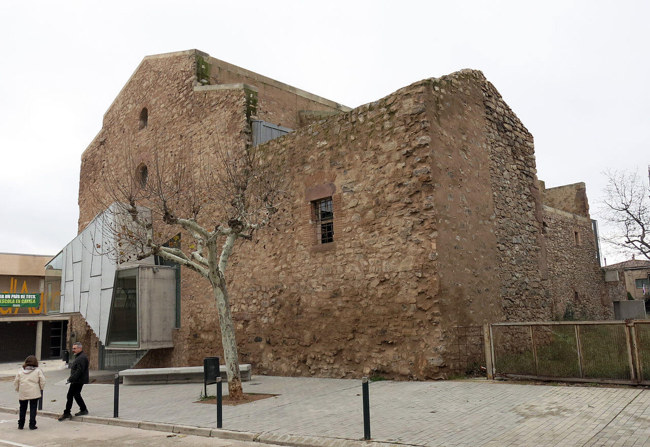 exterior of stone building with contemporary intervention by David Closes