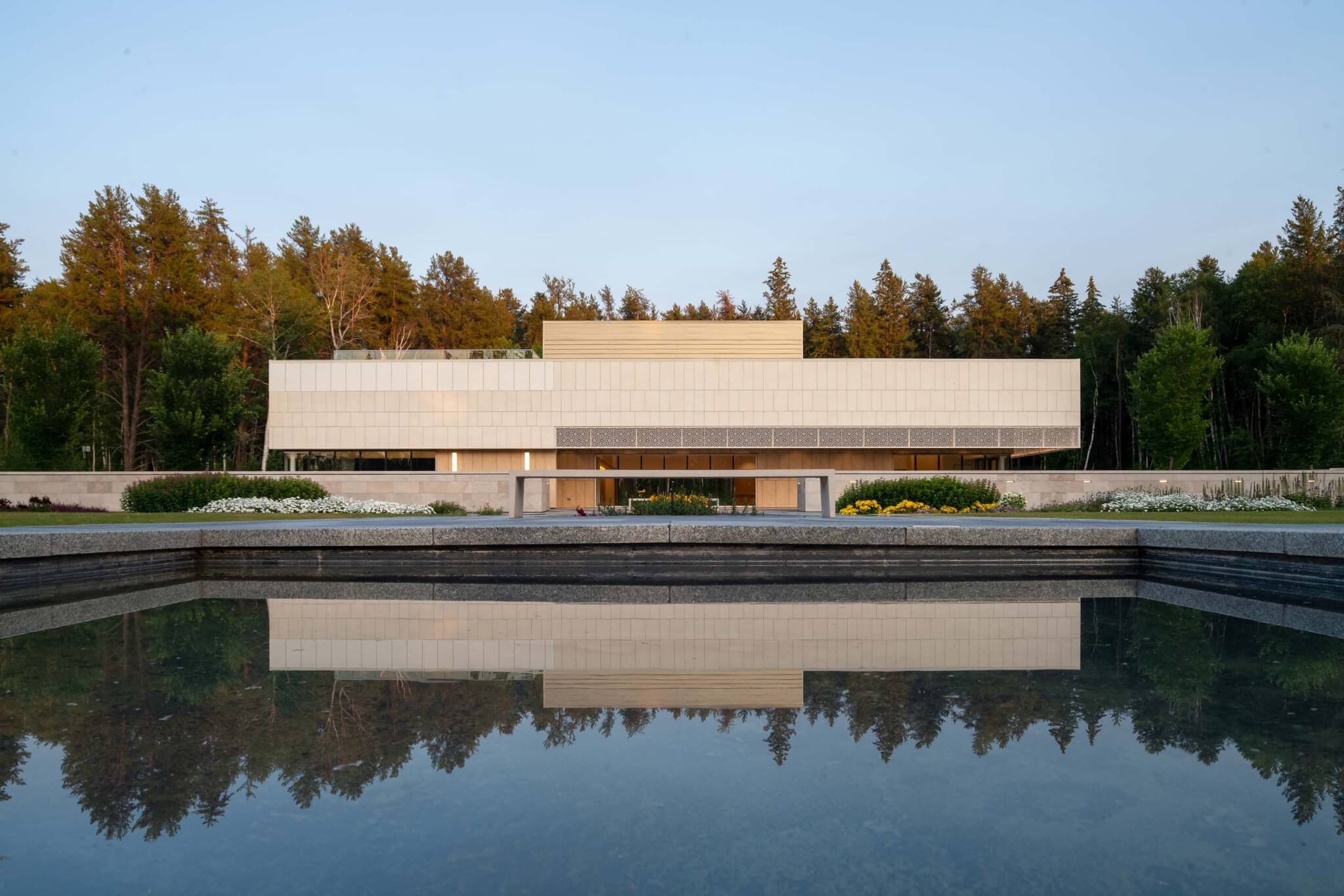 a reflecting pool in front of the building