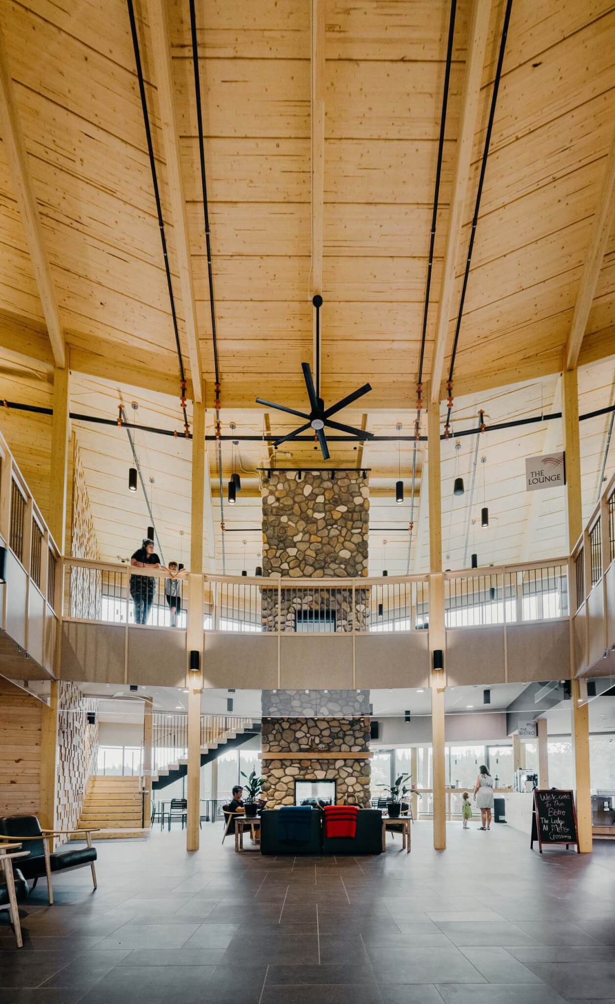 interior columns and large stone fireplace