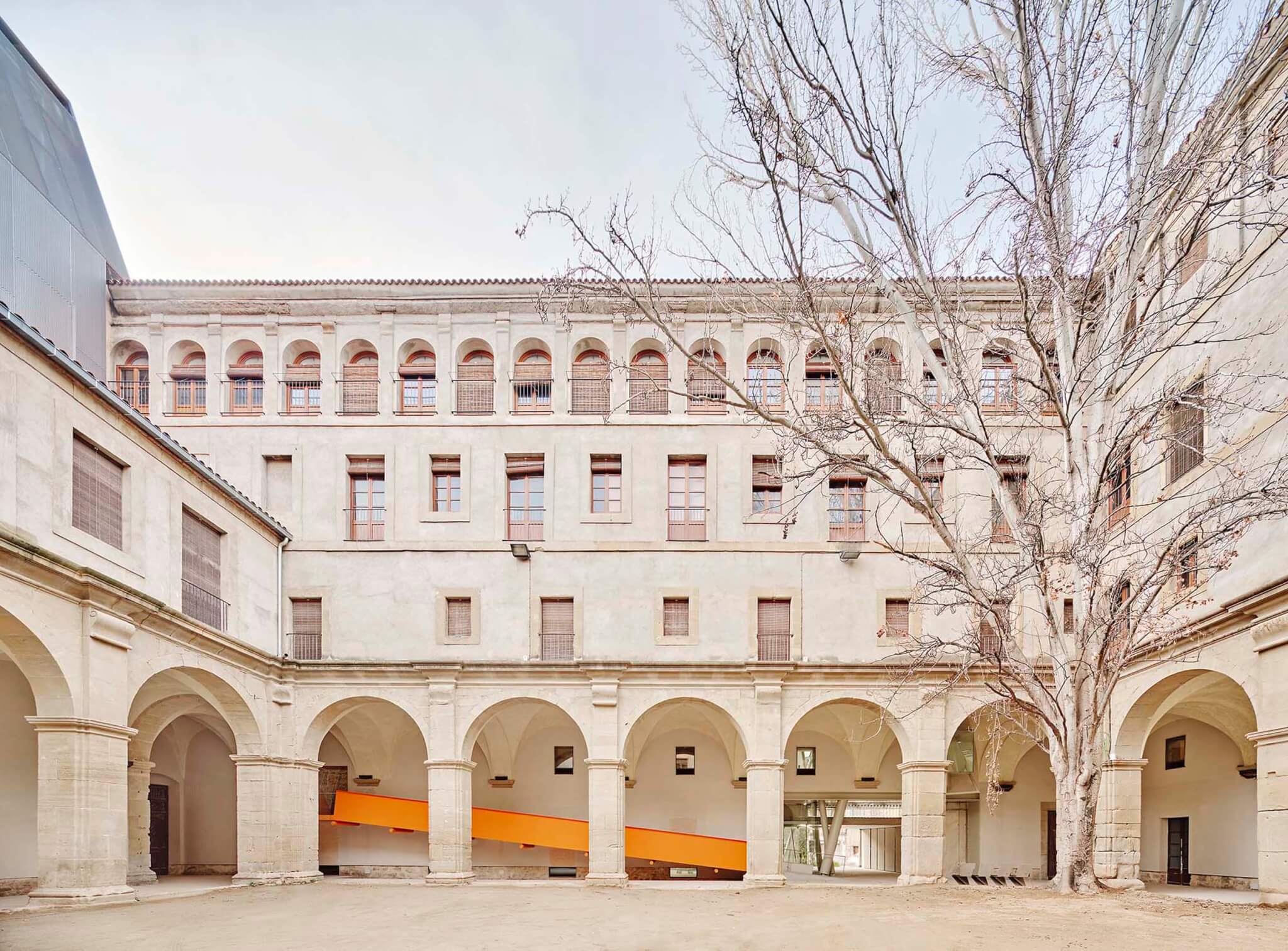 contemporary ramp inside historic cloister 